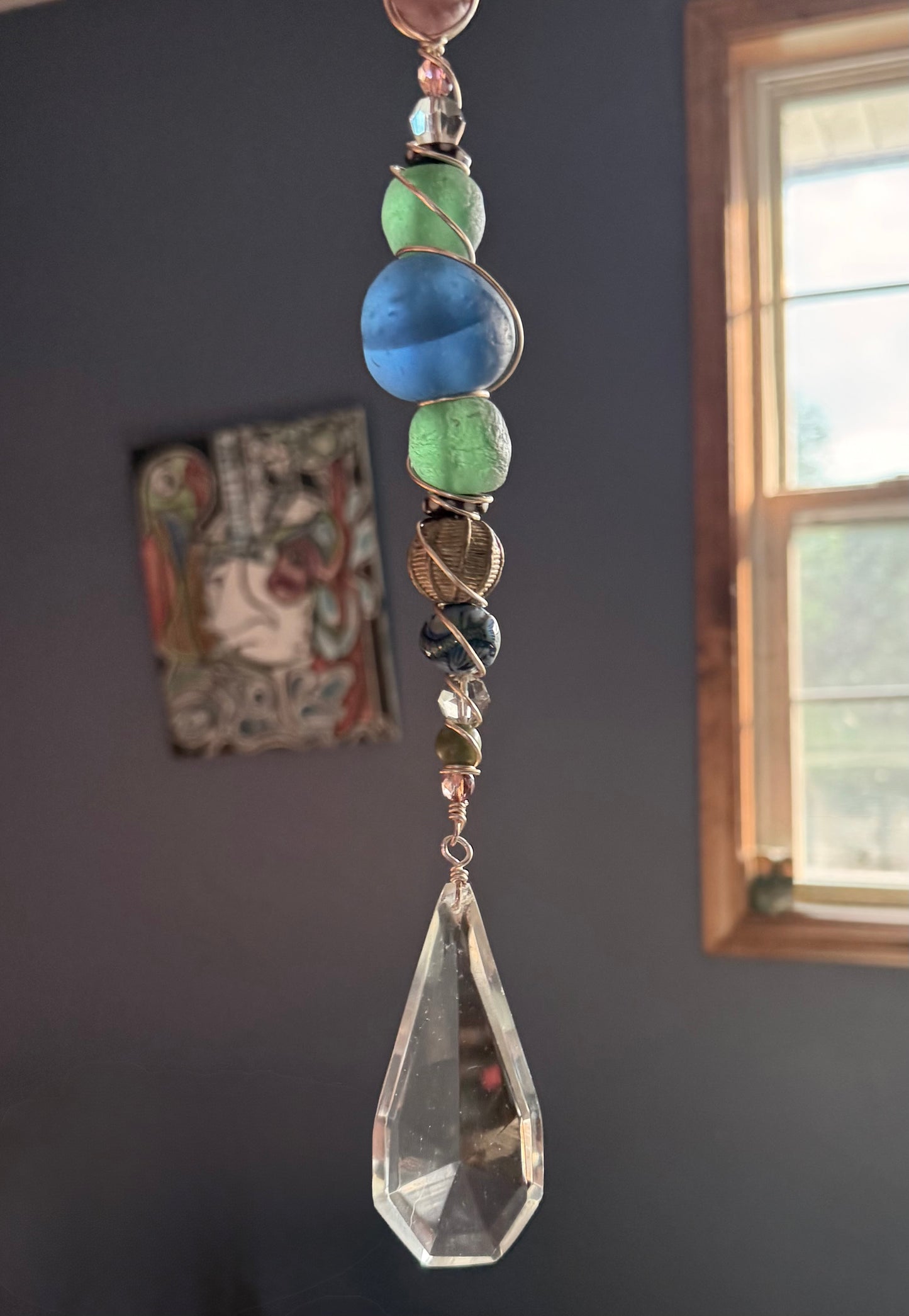 Mermaid’s Glow Sun Catcher with color changing mermaid bead