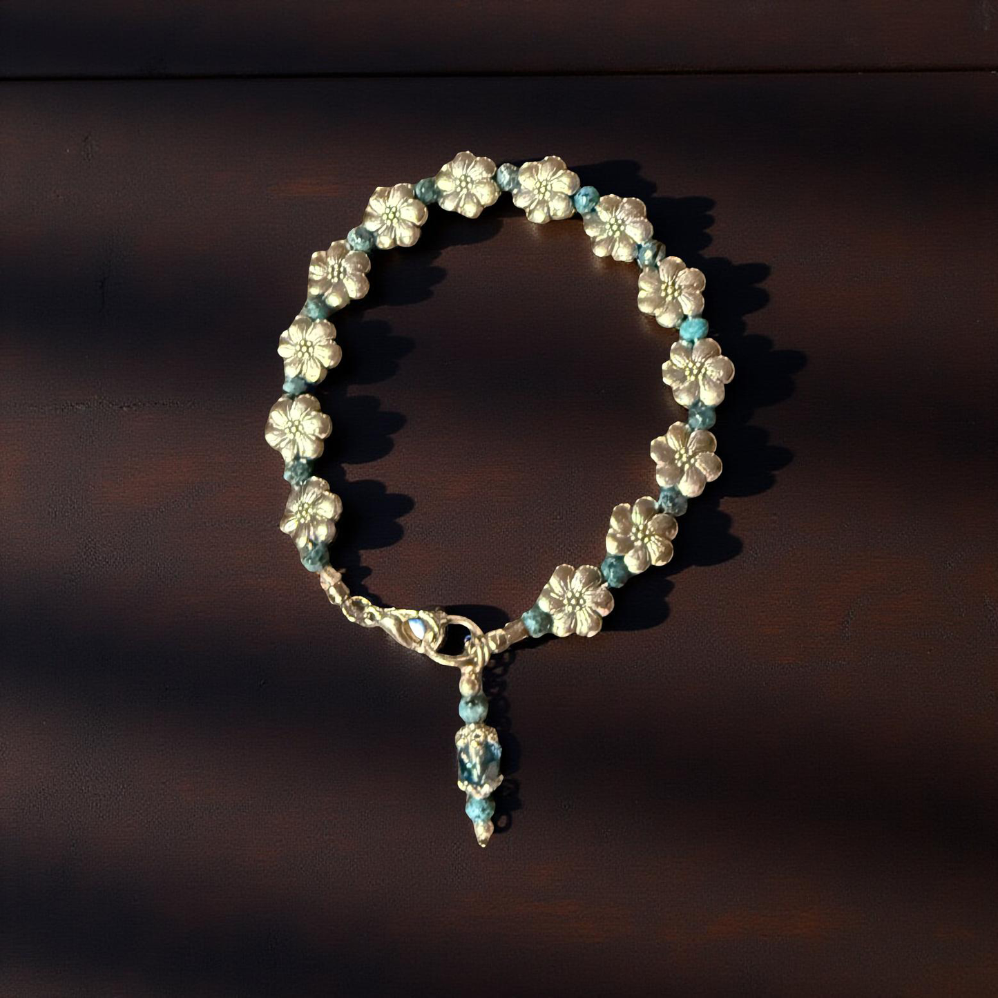 Silver flower with turquoise accent beads bracelet