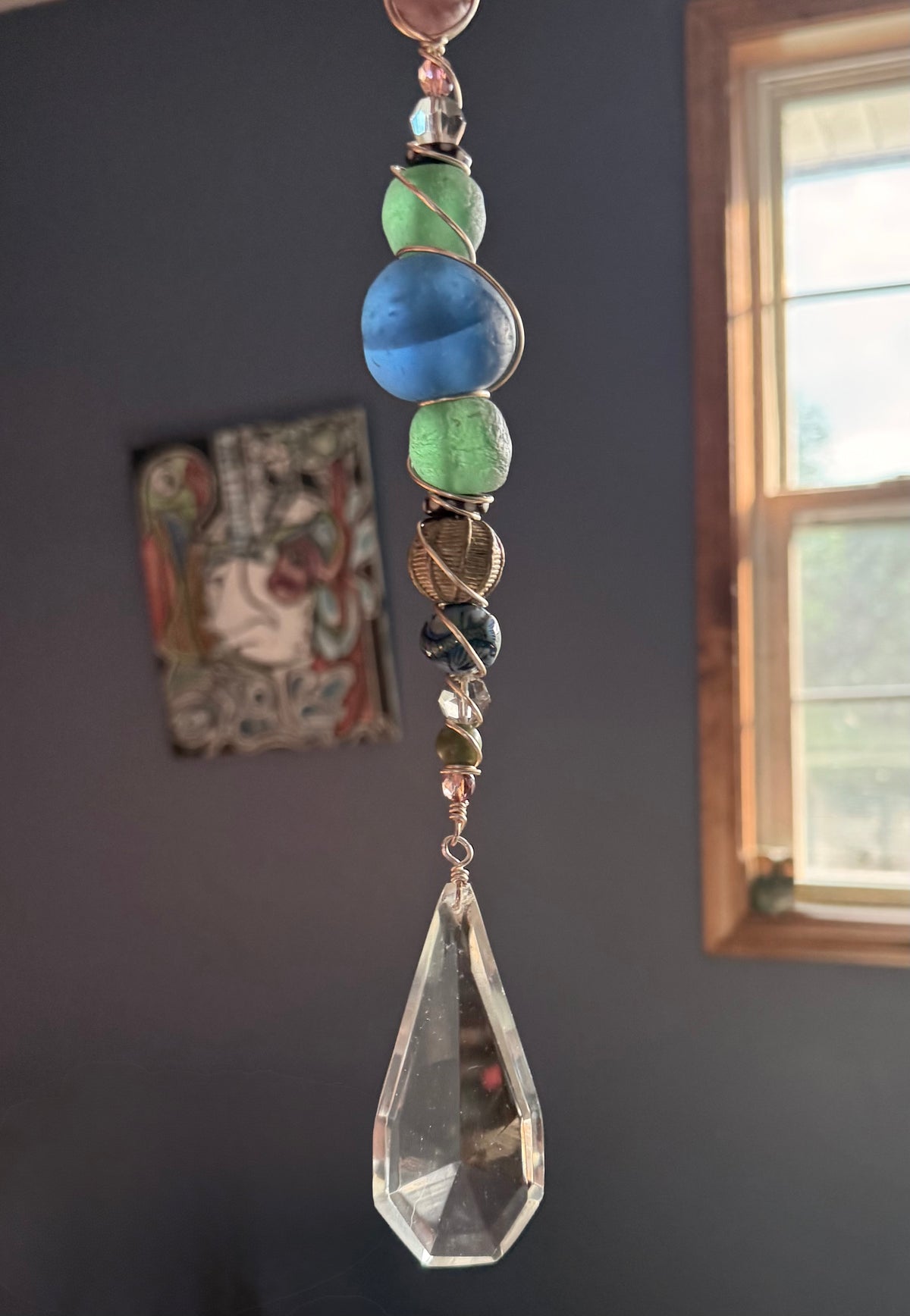 Mermaid’s Glow Sun Catcher with color changing mermaid bead